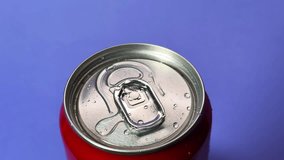 Red Soda Can Spinning 360 with Droplets on Blue Background - Powered by Shutterstock - Get 15% off with code: PIKWIZARD15