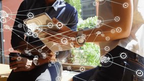 Globe icon appearing on tablet sparking chart folder and building icons forming network around team. Collaboration, digital, connectivity, innovation, technology, workspace, professional - Powered by Shutterstock - Get 15% off with code: PIKWIZARD15