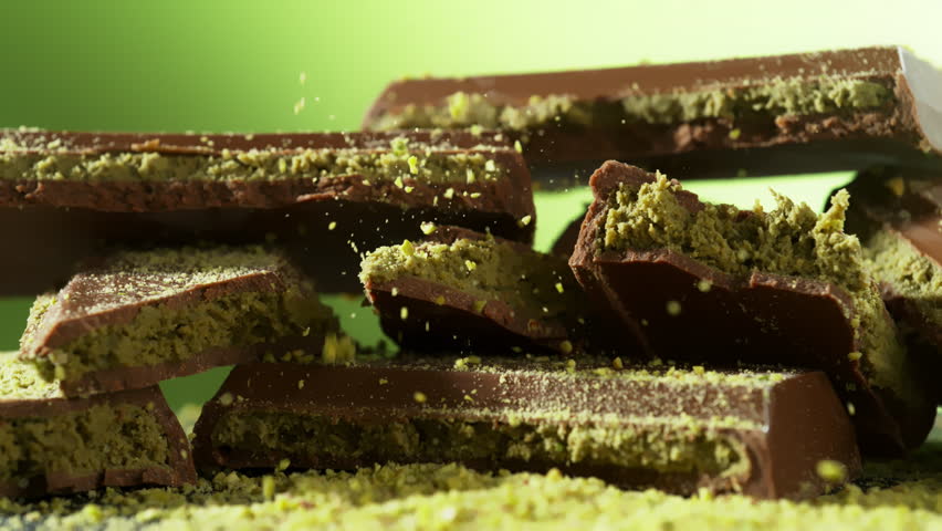 Super Slow Motion of Crushed Pistachios Falling on Dubai Chocolate Pieces at 1000fps.