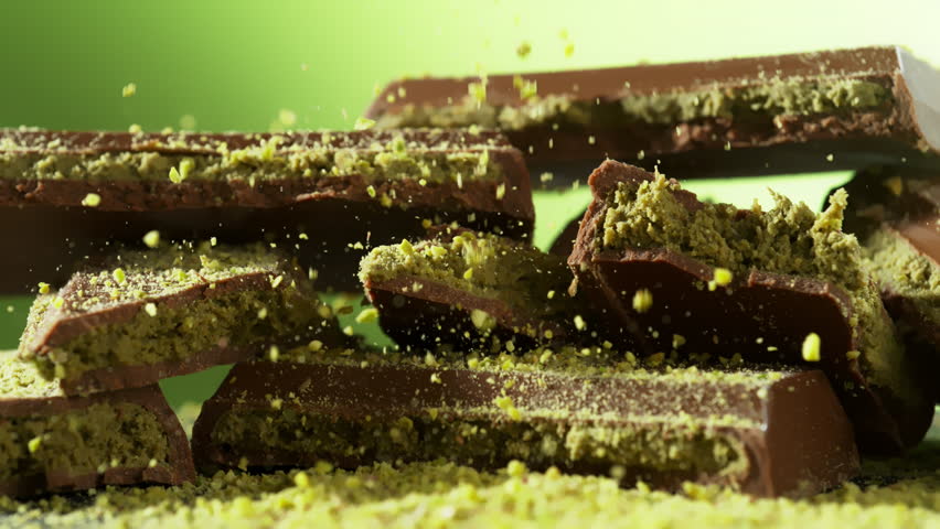 Super Slow Motion of Crushed Pistachios Falling on Dubai Chocolate Pieces at 1000fps.