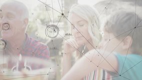 Grandfather speaking at patio table, generating tech data nodes and charts showing conversation. Family, technology, communication, outdoor, connection, digital, generational - Powered by Shutterstock - Get 15% off with code: PIKWIZARD15