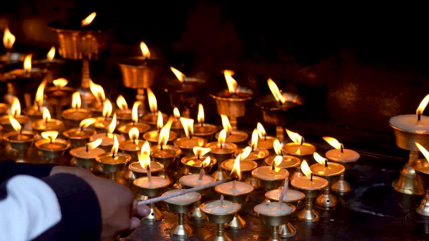 burning earthen lamp around Temple in Kathmandu, Nepal.
