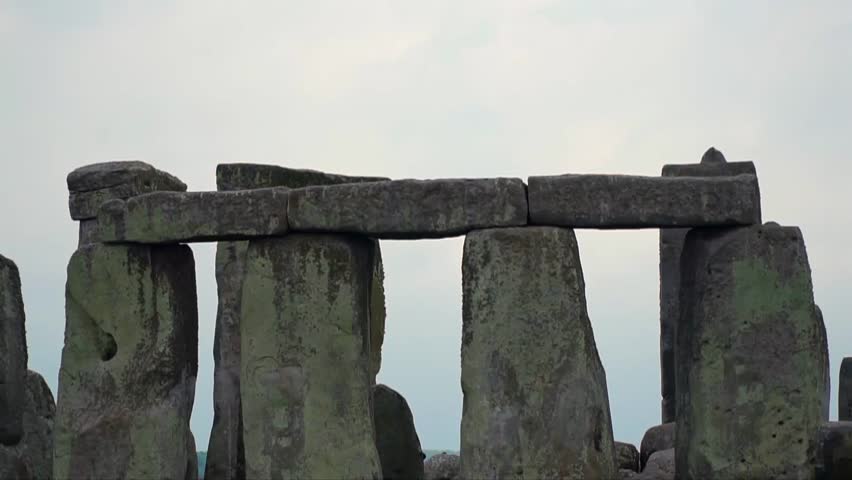 Massive standing stones of Stonehenge aligned under evening light, showcasing England’s iconic prehistoric monument near Salisbury on the Wiltshire plains.