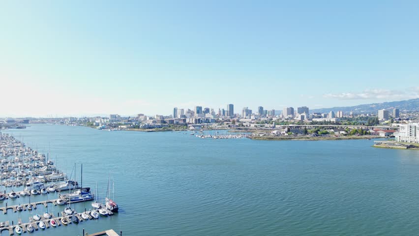 An aerial panning shot of the Inner Harbor between Alameda and Oakland California