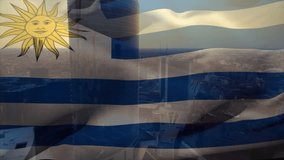 Uruguay flag rippling over city skyline through glass with sun descending illuminating folds. Patriotism, urban, reflection, sunset, modern, civic, skyline - Powered by Shutterstock - Get 15% off with code: PIKWIZARD15