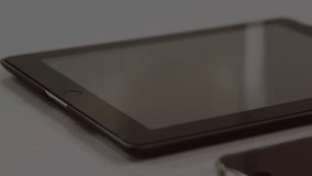 Binary digits falling over tablet as smartphone sliding in, smartwatch aligning for digital overlay. Technology, innovation, digital, cybersecurity, gadgets, modernism, connectivity - Powered by Shutterstock - Get 15% off with code: PIKWIZARD15