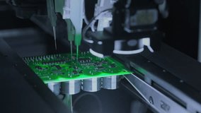 Close-up: machine installs components on circuit board. Electronic devices PCB industry. Factory of graphics processing unit, GPU processor. Production of video cards for artificial intelligence. - Powered by Shutterstock - Get 15% off with code: PIKWIZARD15