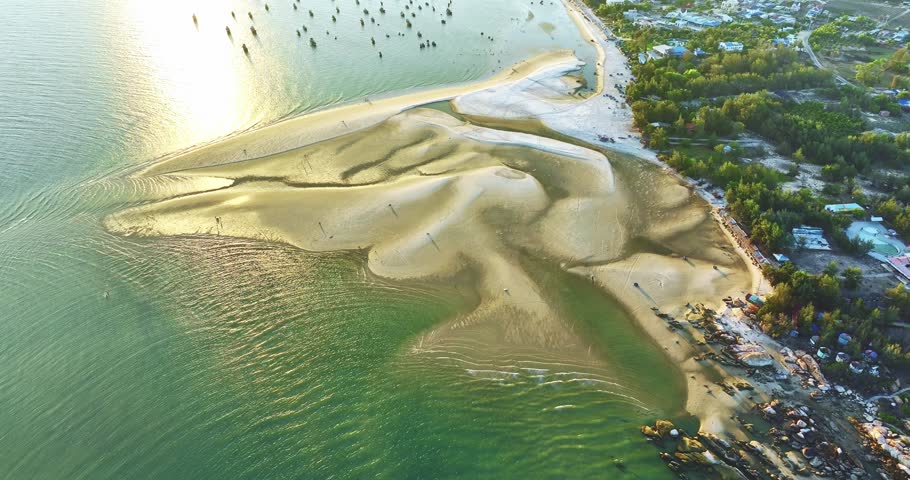 Aerial view of sea Mui Ne, Vietnam see the whole bay of Ke Ga from north to south shore very large with sea waves, ships, reefs is tourism potential Status of Vietnam.