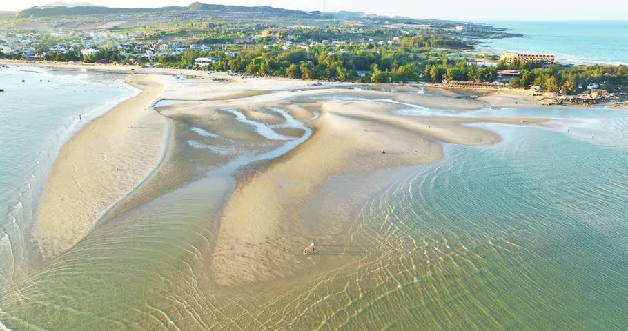 Aerial view of sea Mui Ne, Vietnam see the whole bay of Ke Ga from north to south shore very large with sea waves, ships, reefs is tourism potential Status of Vietnam.