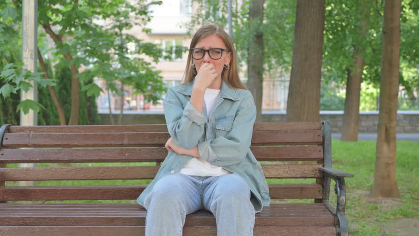 Crying Anxious Woman Sitting Outdoor on Bench