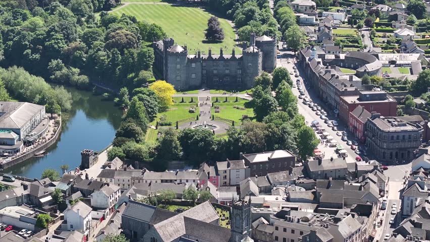 Kilkenny Castle and rose garden with fountain. Aerial of tourist attraction in Ireland.