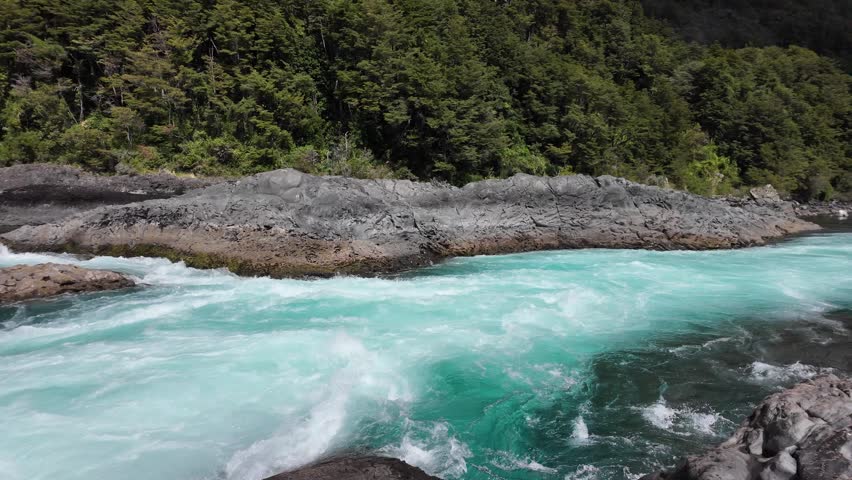  Powerful River Rapids Crashing Over Rocks in Forest