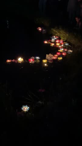 An Enchanting River Scene Illuminated by Floating Lanterns and Candlelight, Casting a Warm Glow of Serenity, Reflection, and Cultural Celebration