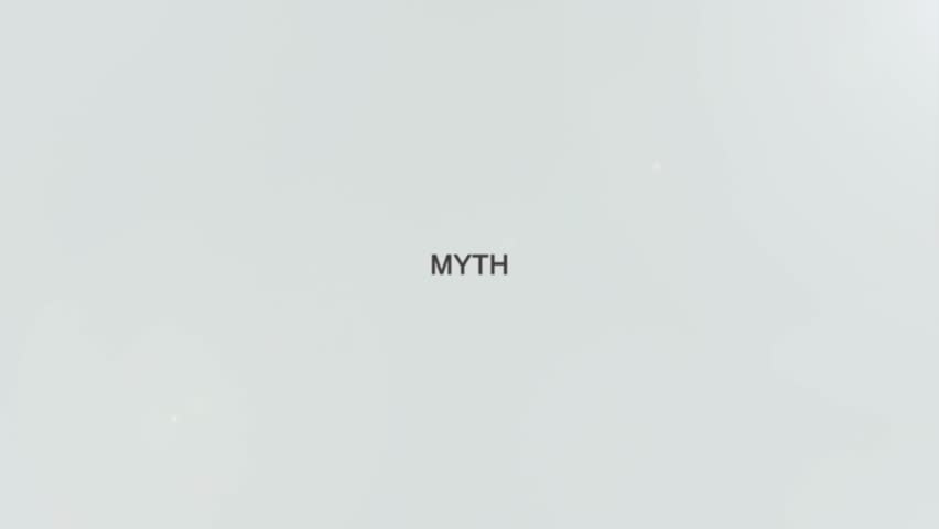 The word "Myth" highlighted by a magnifying glass held in a hand on a white background, symbolizing legend, belief, and ancient stories