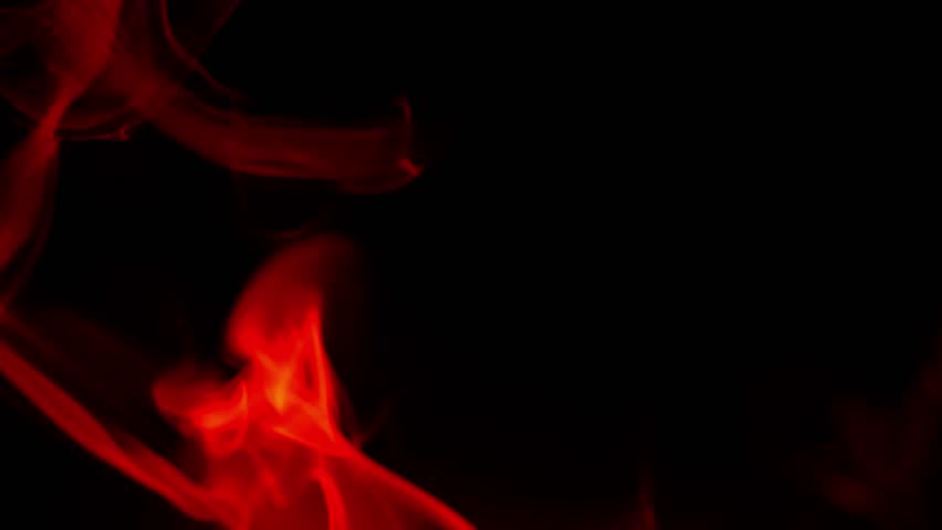 Red smoke pattern in the dark.Smoke background in black and red tones.Mystical atmosphere with fog and smoke. 4k footage