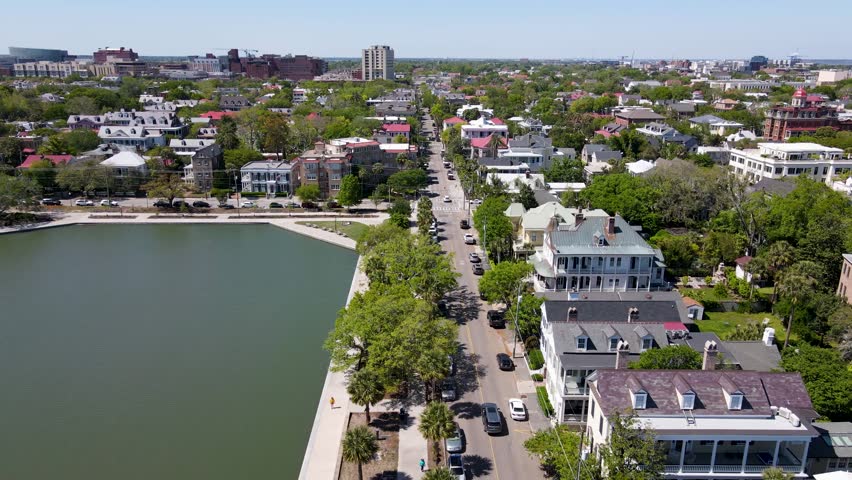 Charleston South Carolina aerial shot of Colonial Lake Park and street dolly forward shot close up