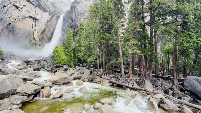 Spring view of Yosemite Falls as seen from the Yosemite Valley floor. Taken in Yosemite National Park, California, USA
