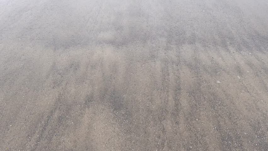 Hirtshals, Denmark Rough surf and undertow on a North Sea beach. 