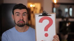 Man showing a question mark  - Powered by Shutterstock - Get 15% off with code: PIKWIZARD15