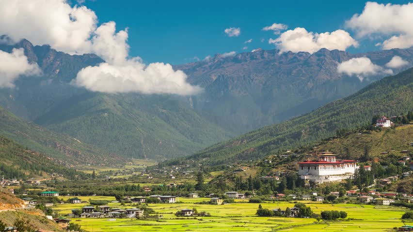 Looking out over the city of Paro in Bhutan. The Rinpung Dzong can be seen. Time Lapse.