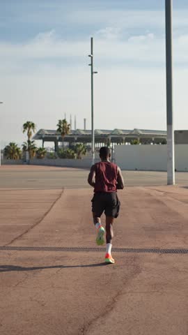 Man running fast for fitness wellness, sport workout and exercise training for athletics marathon in the city