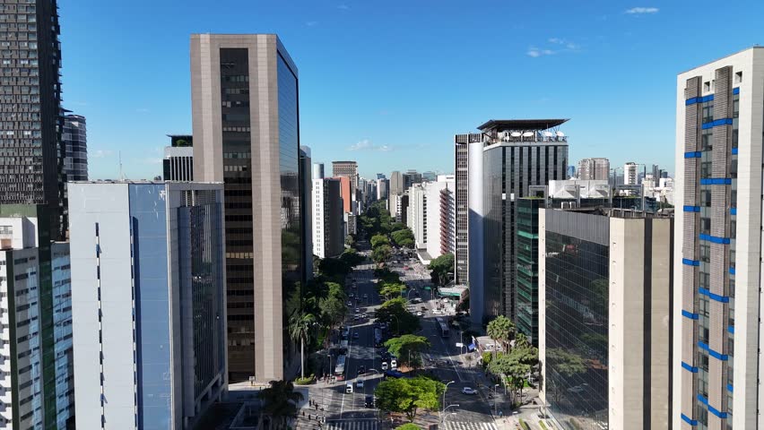 Aerial view of Avenida Faria Lima in São Paulo showing traffic, commercial buildings, and one of the city’s main business districts