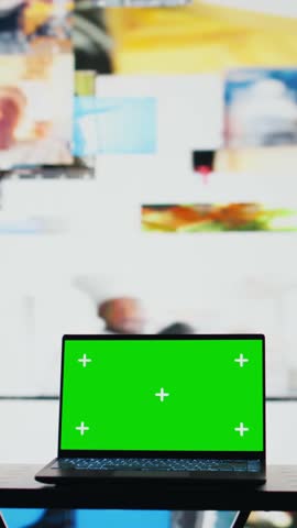 Vertical Video Screen running copy space mockup on laptop next to social network apps, modern web design and user interface for easy online connection. Mobile interaction on media. Camera B.