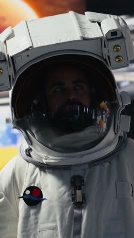 Vertical Video Space man on a deep space mission surrounded by stars and the vast galaxy, showcasing science and exploration. Astronaut with helmet travelling in the universe within, human curiosity