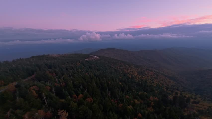 Aerial twilight view of misty mountains under colorful sky in Appalachian Mountains USA