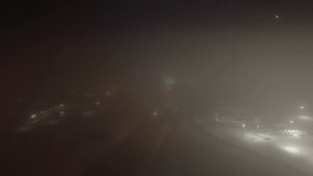 Low visibility aerial over Canada city winter at night plane window view descend - Powered by Shutterstock - Get 15% off with code: PIKWIZARD15