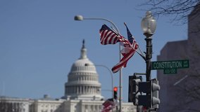 American construction flag waving. American construction at Capitol. Capitol in Washington DC. American construction site in Capitol. Construction and democracy in action. Vote and elect in America. - Powered by Shutterstock - Get 15% off with code: PIKWIZARD15