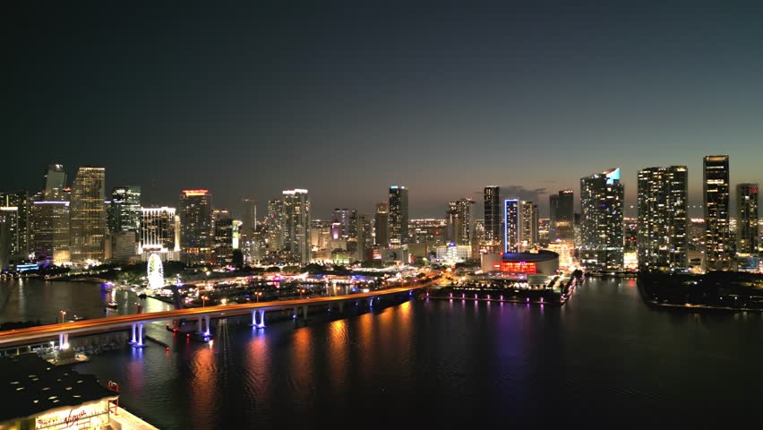 Aerial view of beautiful Miami Beach city at night. Drone shot of Miami on dawn. Miami Beach, wonderful aerial view of skyscrapers at sunset. Panorama view of Miami Beach, South Beach, USA.