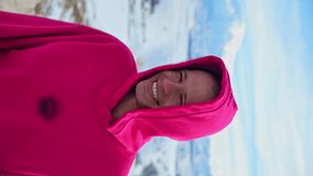 Positive smiling Caucasian guy man close-up portrait looking at camera in hoodie outdoors. Close-up shallow depth of field - Powered by Shutterstock - Get 15% off with code: PIKWIZARD15