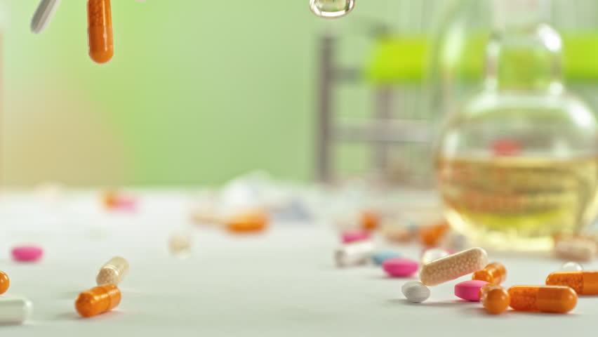 Super Slow Motion of Various Pills Falling in Pharmacy Table at 1000fps.