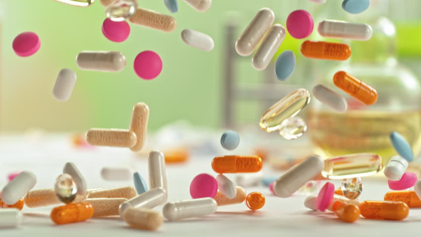 Super Slow Motion of Various Pills Falling in Pharmacy Table at 1000fps.