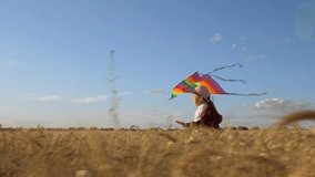 Child kid girl run kite, girl flying colorful kite, Child kid girl run kite happy childhood nature, freedom joy field, summer outdoor activity, blue sky golden wheat field, windy day adventure - Powered by Shutterstock - Get 15% off with code: PIKWIZARD15
