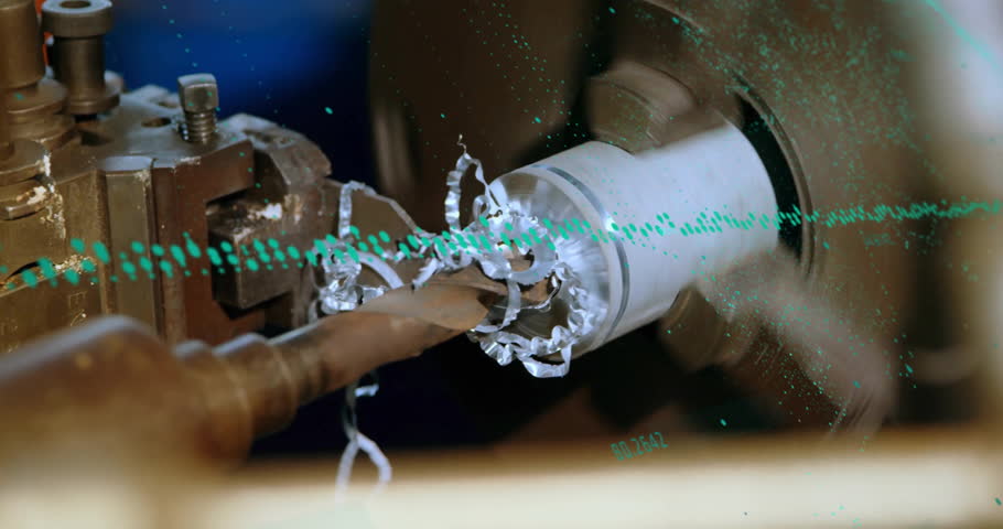 Rotating cutting tool approaching cylinder, peeling swarf as green overlay sweeps by tracking depth. Manufacturing, machining, metalwork, industrial, automation, precision, technology