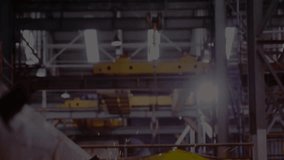 Factory worker striking torch while welding beam joints as sparks scatter under binary overlay. Industrial, craftsmanship, technology, manufacturing, precision, safety, innovation - Powered by Shutterstock - Get 15% off with code: PIKWIZARD15