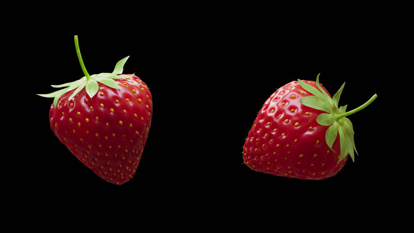 Cyclic rotation of two types of strawberry around their axis. Looping motion. Close-up. Alpha Channel.