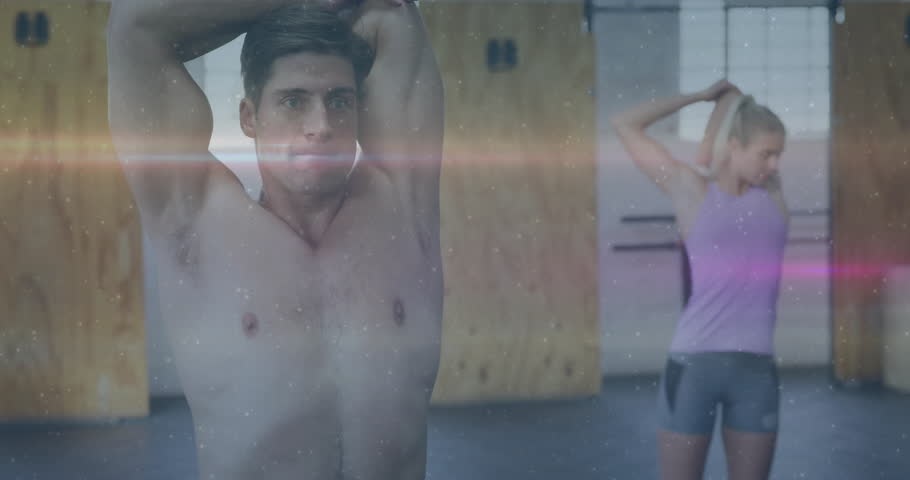 Fitness duo holding tricep stretch in gym, initiating animated follower and like counts rising. Fitness, strength, wellness, motivation, training, digital, modern