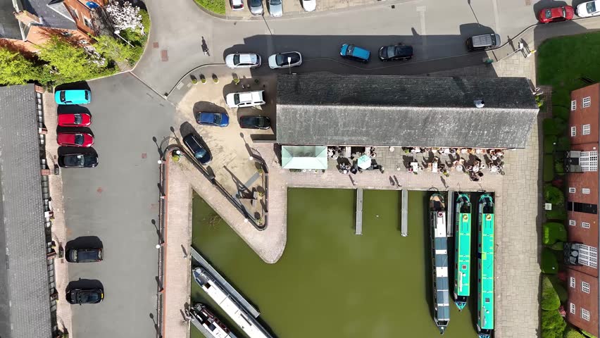 A rotating and rising view of the Canal Basin in Market Harborough, UK in springtime