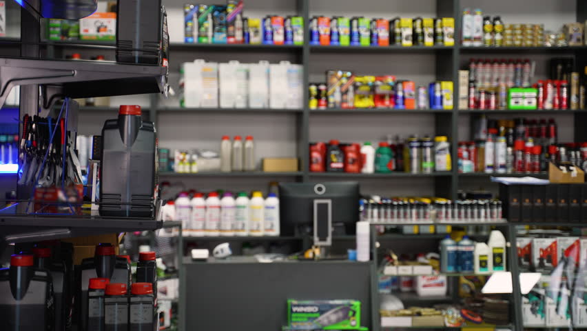 Senior Driver Choosing Truck Motor Oil in Store