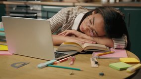 Sleeping tired woman exhausted American Latina ethnic girl weary lazy female high school student overworked businesswoman relax nap on table boring studying at home kitchen sleep napping close eyes - Powered by Shutterstock - Get 15% off with code: PIKWIZARD15