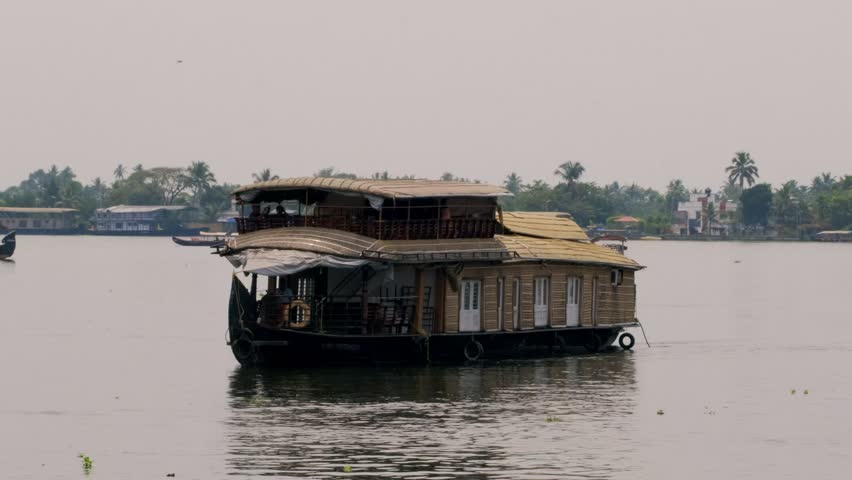 Traditional houseboats floating on kerala backwaters