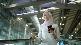 Young asian muslim woman wearing hijab using smartphone checking flight at airport terminal. Islamic woman people lifestyle travel. Muslim people concept.
 - Powered by Shutterstock - Get 15% off with code: PIKWIZARD15