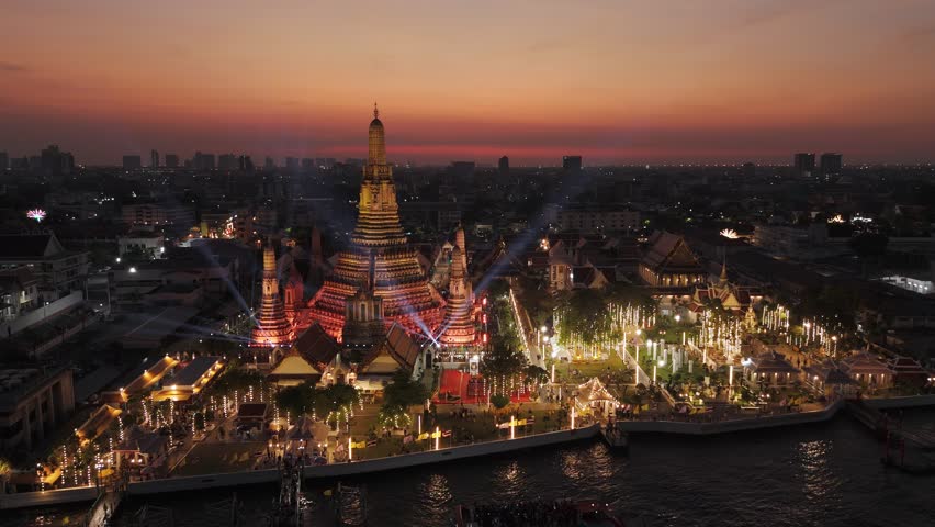 Wat arun temple glowing with vibrant festival illumination, Aerial View, Bangkok, Thailand