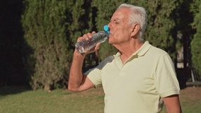 Video of Elderly man drinks water and wipes sweat from his forehead on a hot summer day - Powered by Shutterstock - Get 15% off with code: PIKWIZARD15