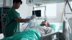 Doctor providing oxygen ventilation to unconscious patient in hospital. - Powered by Shutterstock - Get 15% off with code: PIKWIZARD15
