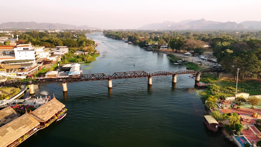 Aerial view of the river kwai bridge in kanchanaburi, thailand, showcasing its historical significance and scenic beauty