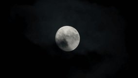 View at full moon at cloudy night sky. Scary atmosphere. Close up shot - Powered by Shutterstock - Get 15% off with code: PIKWIZARD15